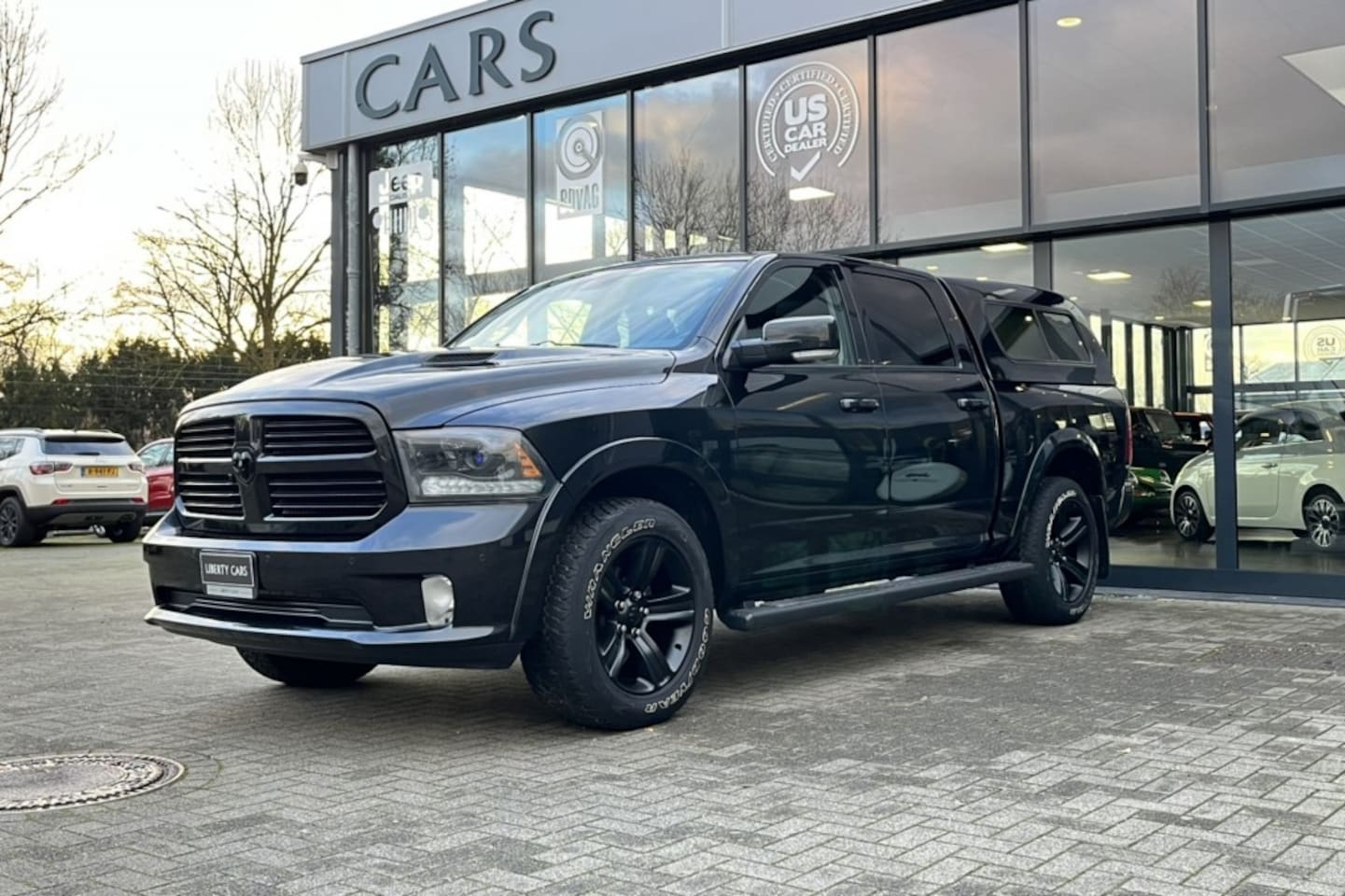 Dodge Ram - 5.7i V8 HEMI SPORT Black Edition CREW CAB 4x4 / LPG - AutoWereld.nl