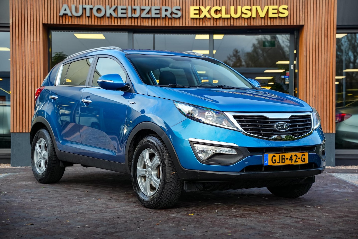 Kia Sportage - 2.0 Comfort Pack AWD 163PK 1ste eigenaar Stoelverw. Climate Cruise Control - AutoWereld.nl