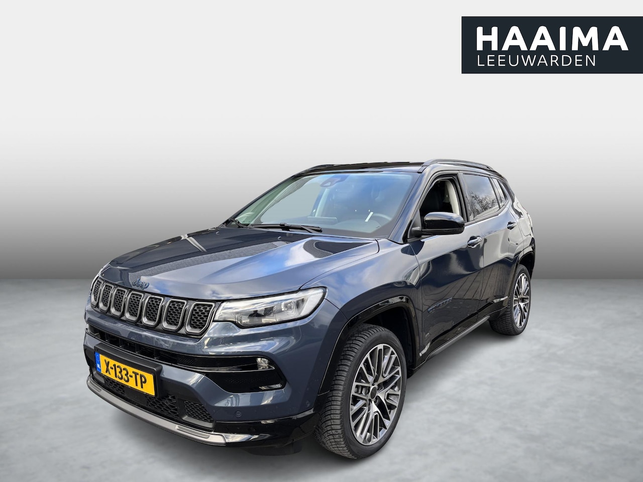 Jeep Compass - 4xe 240 Plug-in Hybrid Electric Summit | Leder | Camera | Stoel/Stuur Verwarming | All Sea - AutoWereld.nl