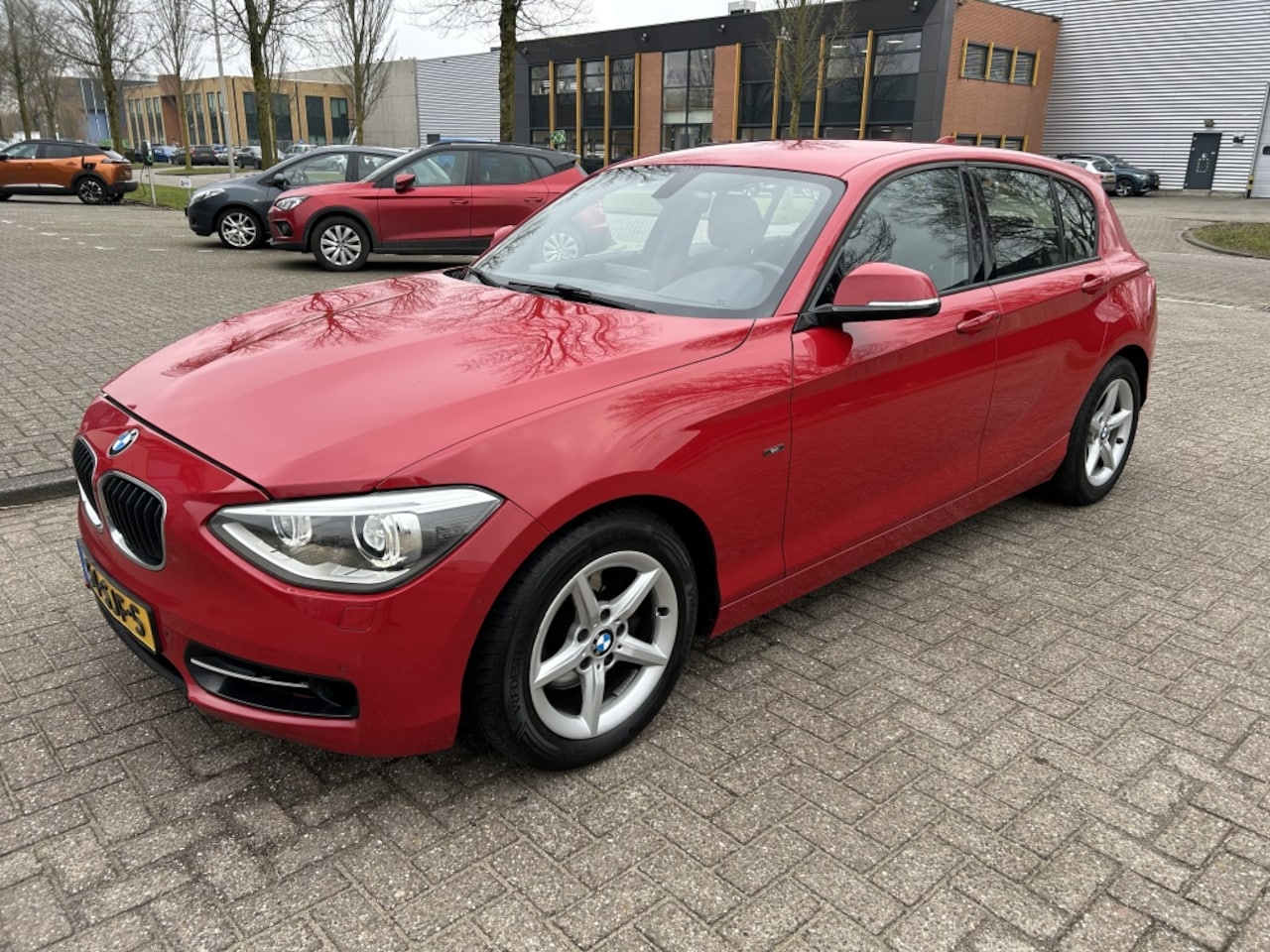 BMW 1-serie - 118i Business Sport 170PK XENON NAVI NAP! - AutoWereld.nl