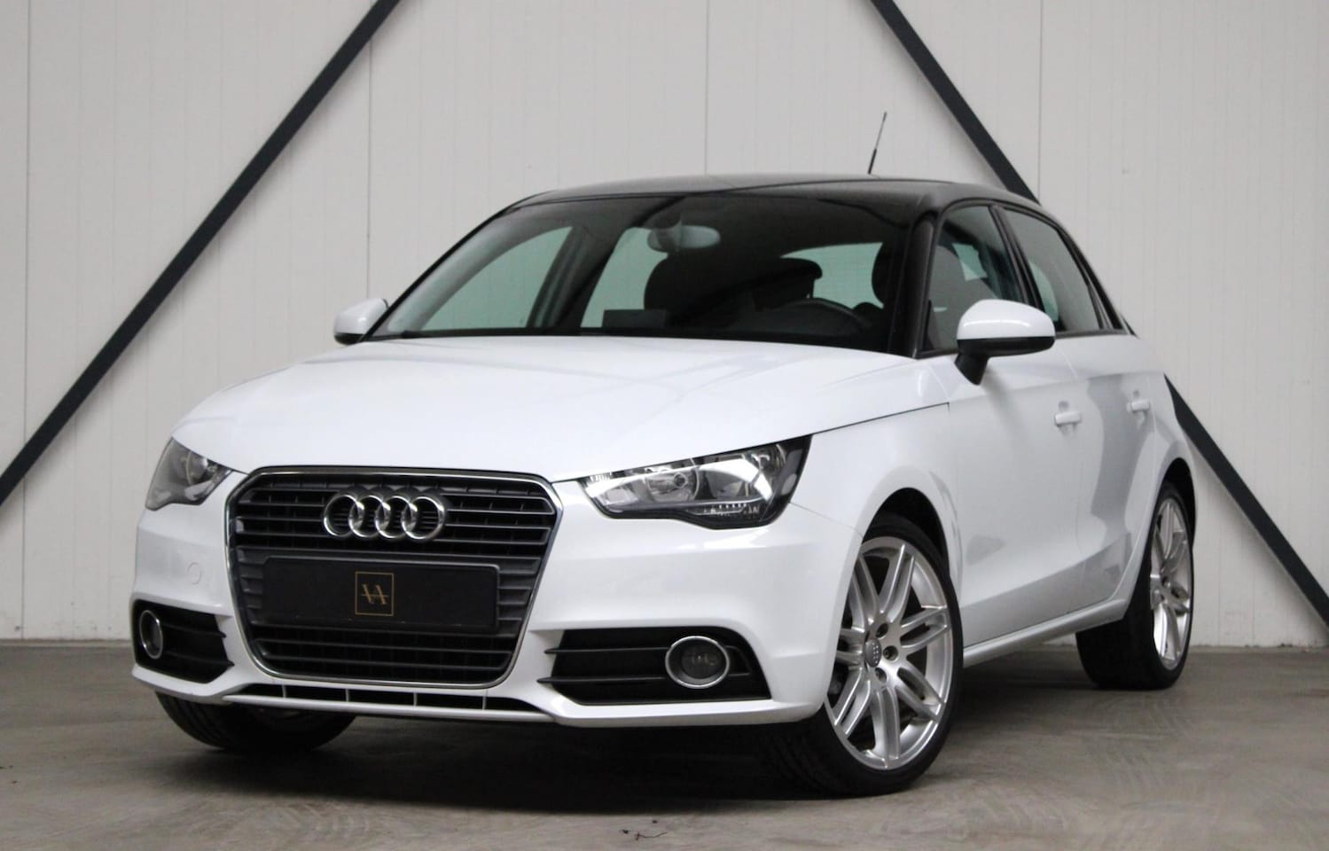 Audi A1 Sportback - 1.4 TFSI Ambition l NAVI l PDC l 18 inch l Stoelverwarming - AutoWereld.nl