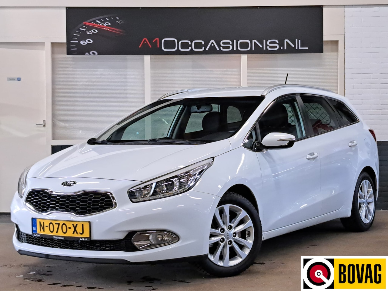 Kia Cee'd Sportswagon - 1.4 CVVT + NAVI - AutoWereld.nl