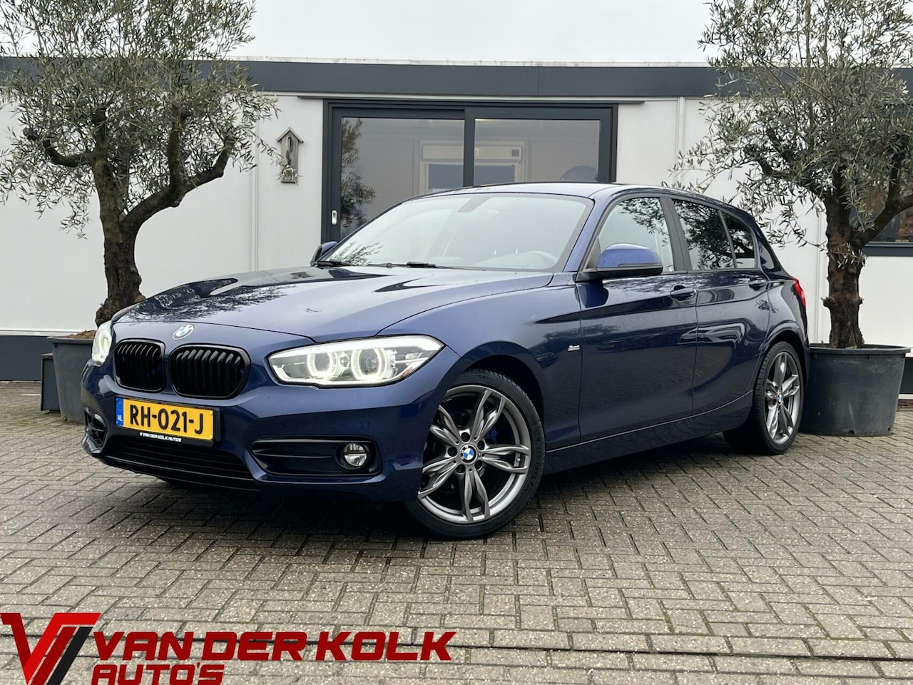 BMW 1-serie - 118i Executive Automaat Navi Cruise Climate LED - AutoWereld.nl