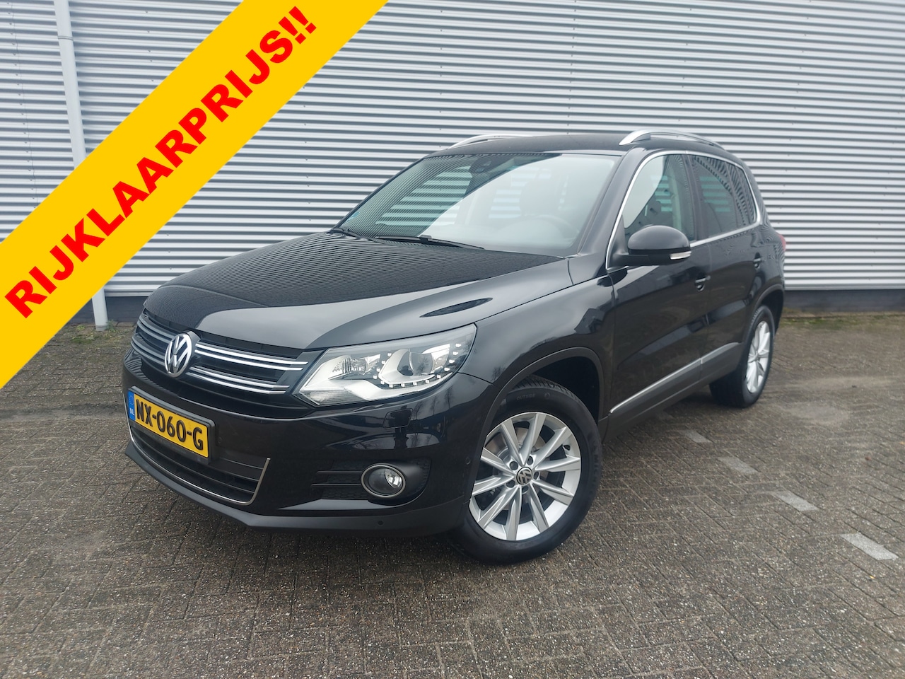 Volkswagen Tiguan - 1.4 TSI Sport&Style , airco,cruisecontrol,trekhaak,navigatie,stoelverwarming,parkeersensor - AutoWereld.nl