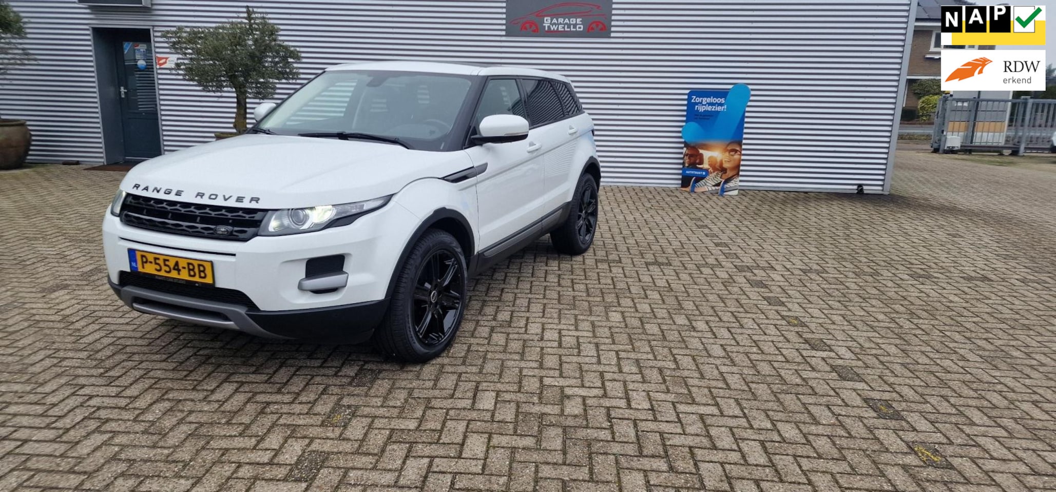 Land Rover Range Rover Evoque - 2.0 Si 4WD Pure 2.0 Si 4WD Pure, vol leder, panorama dak, trekhaak, deze Land Rover is dealer onderhouden. - AutoWereld.nl