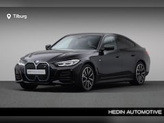 BMW i4 - eDrive40 High Executive 84 kWh | Achteruitrijcamera | Cruise Control | PDC Voor/Achter |