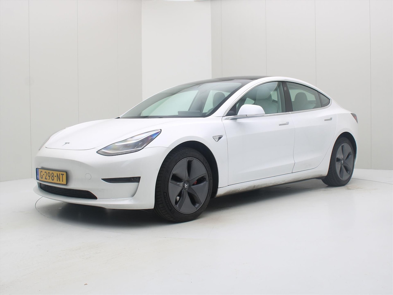 Tesla Model 3 - Long-Range AWD 351pk 75 kWh [ TREKHAAK+WIT LEDER+AUTOPILOT+620KM WLTP+PREMIUM AUDIO ] - AutoWereld.nl