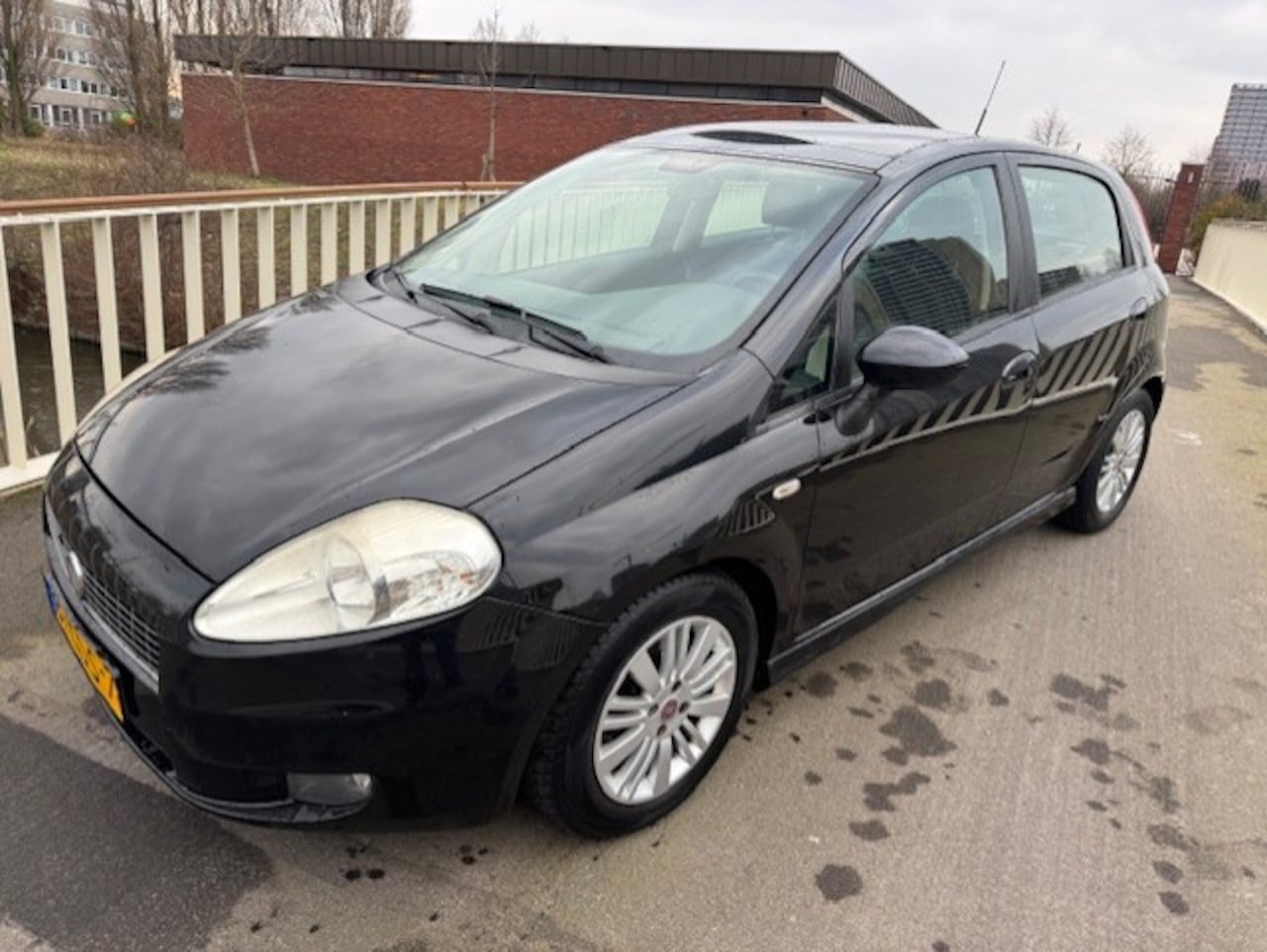 Fiat Grande Punto - 1.4-16V Ed. Lusso 1.4-16V Ed. Lusso - AutoWereld.nl