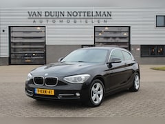 BMW 1-serie - 114i EDE Executive / Xenon / Navigatie / N.A.P