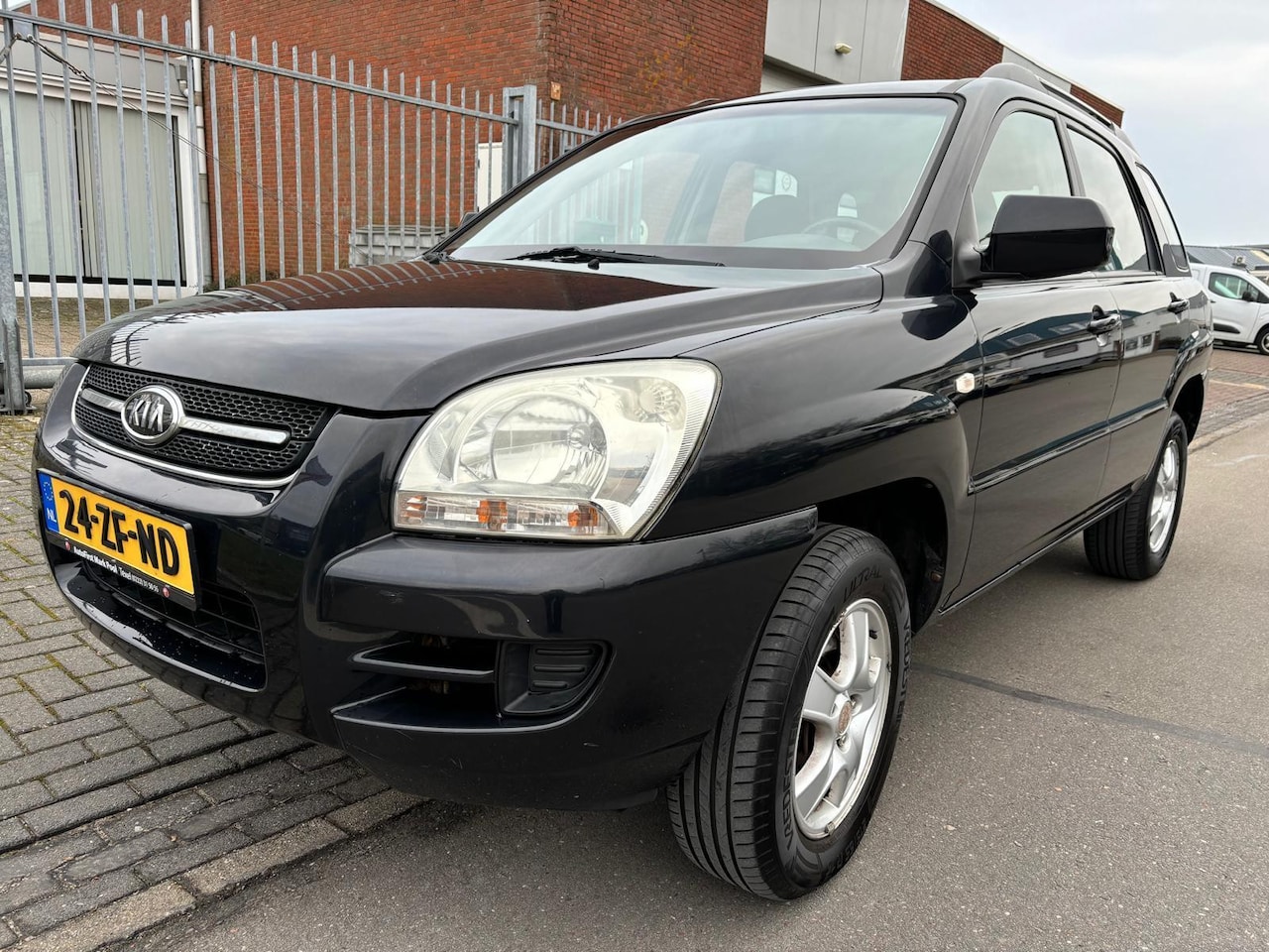 Kia Sportage - 2.0 CVVT X-pect / Airco / Elek ramen - AutoWereld.nl