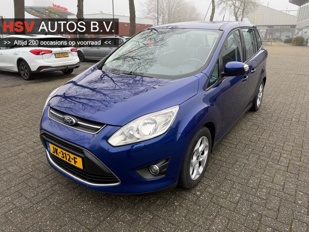 Ford Grand C-Max - 1.6 TDCi Lease 7p navi LM airco - AutoWereld.nl