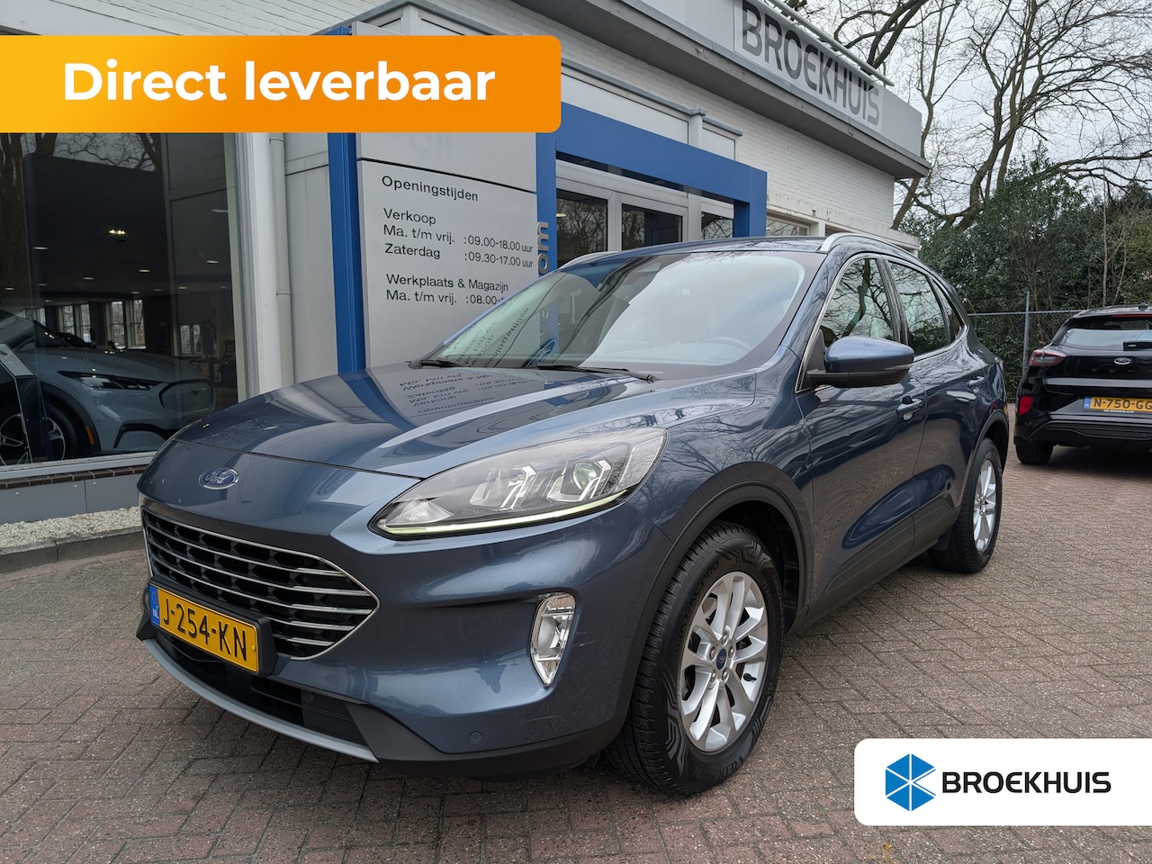 Ford Kuga - 1.5 EcoBoost Titanium | Winterpack | Carplay | Keyless | Trekhaak - 1.800kg Trekgewicht | - AutoWereld.nl