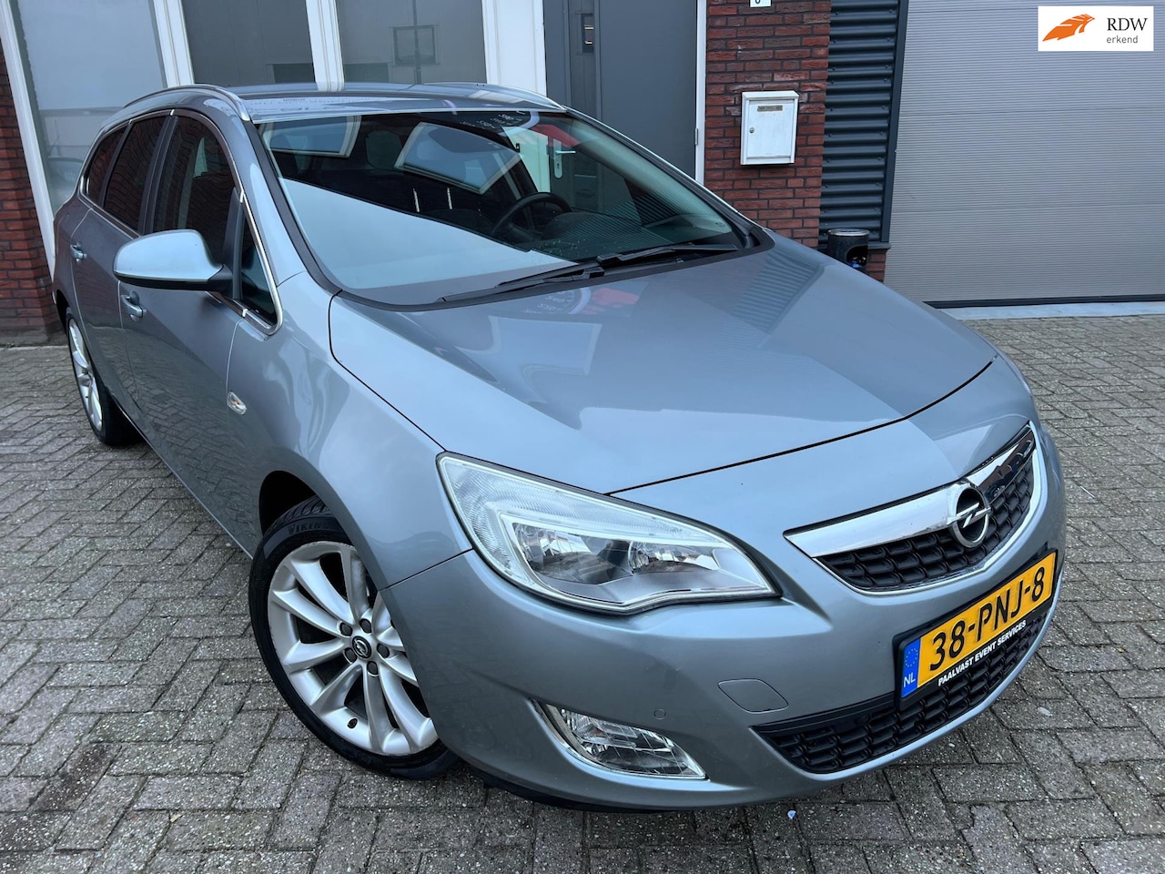 Opel Astra Sports Tourer - 1.4 Turbo Cosmo / Navi / PDC / Cruise / NAP / AUX - AutoWereld.nl