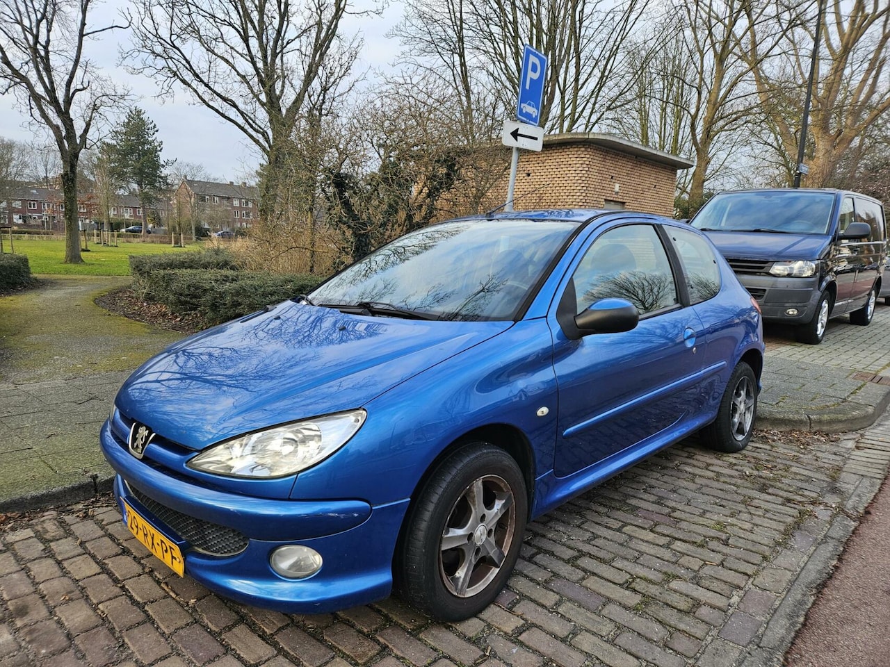 Peugeot 206 - 1.4 Koppakking lek - AutoWereld.nl