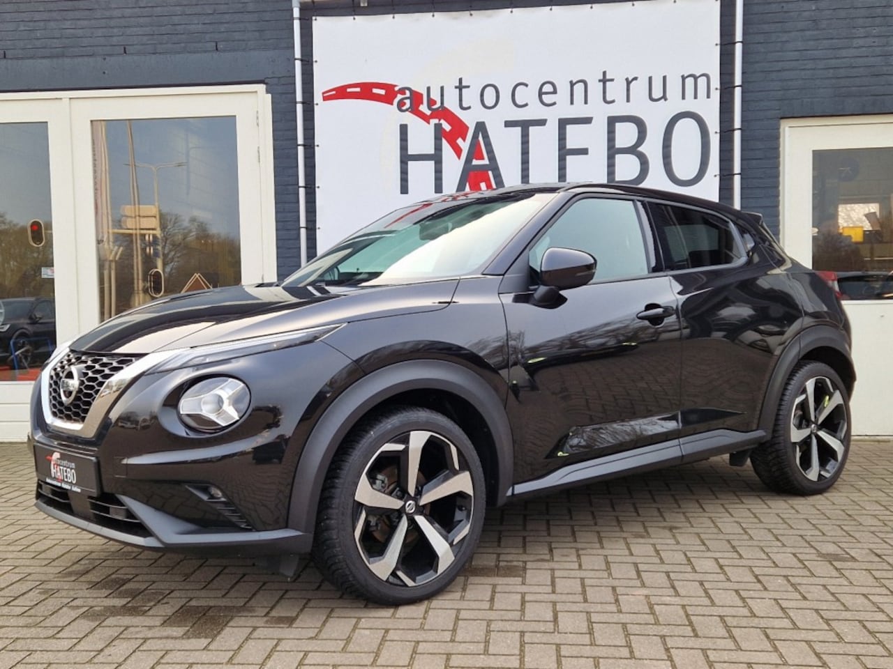 Nissan Juke - 1.0 DIGT TEKNA Aut. Navi Apple ADCR Bose Leder 360gr.Cam - AutoWereld.nl