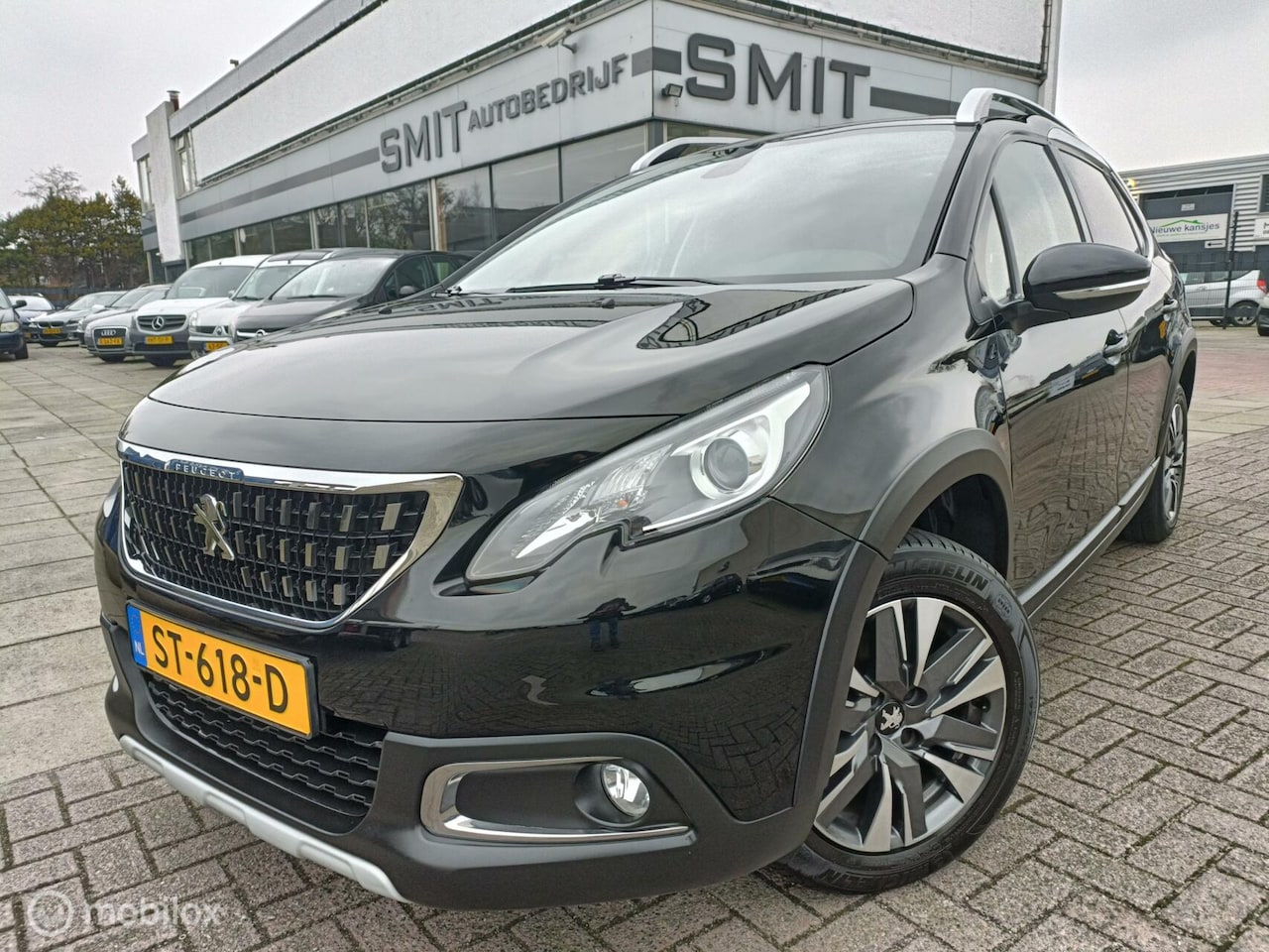 Peugeot 2008 - 1.2 PureTech Allure Nav/Ecc/CC/Led/Trekhaak/NL - AutoWereld.nl