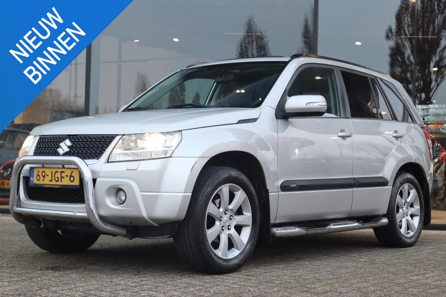 Suzuki Grand Vitara - 2.4 4x4 HIGH EXECUTIVE | SCHUIFDAK | XENON | LEDER | TREKHAAK | KEY-LESS - AutoWereld.nl