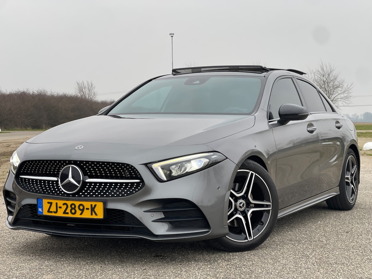 Mercedes-Benz A-klasse - 200 Business Solution AMG Night Upgrade Mercedes A200 AMG Night | Carplay | Pano | Sfeerverl. | Tkh. - AutoWereld.nl