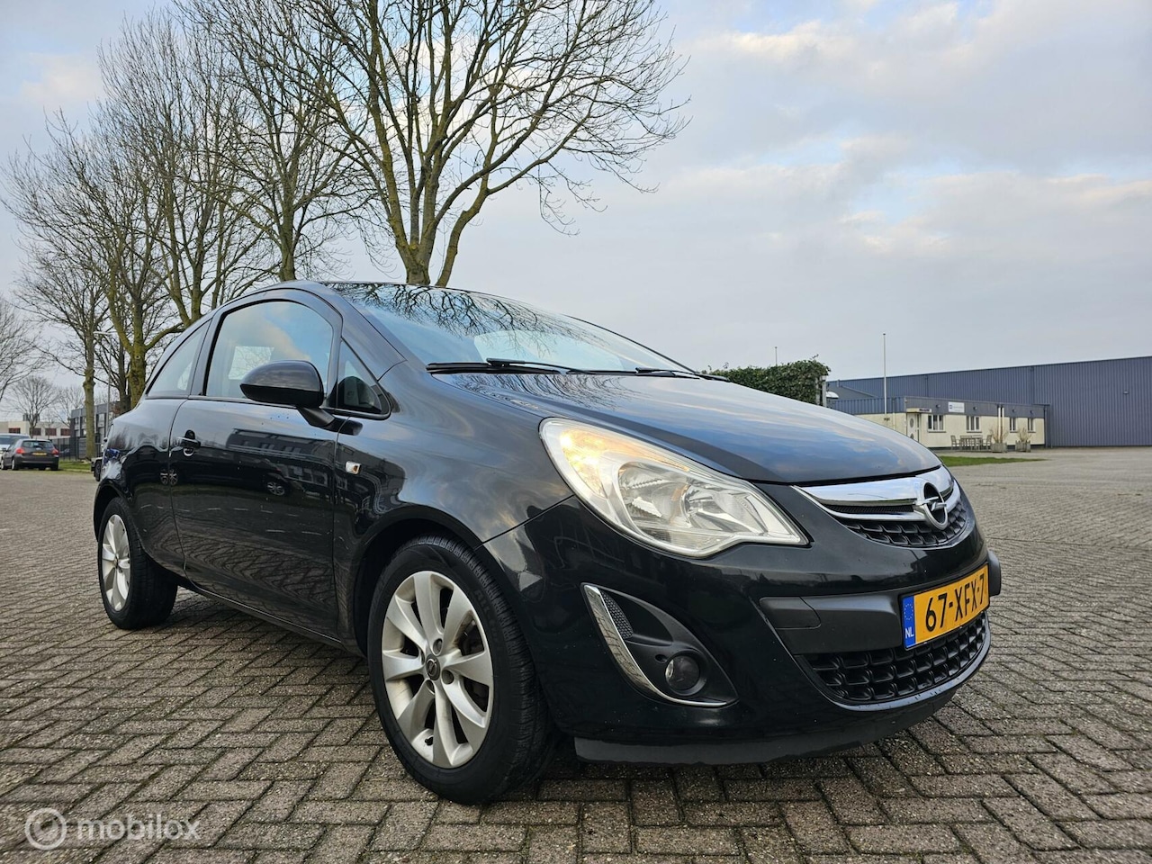 Opel Corsa - 1.2-16V Cosmo Airco Navi Eerste Eigenaar - AutoWereld.nl