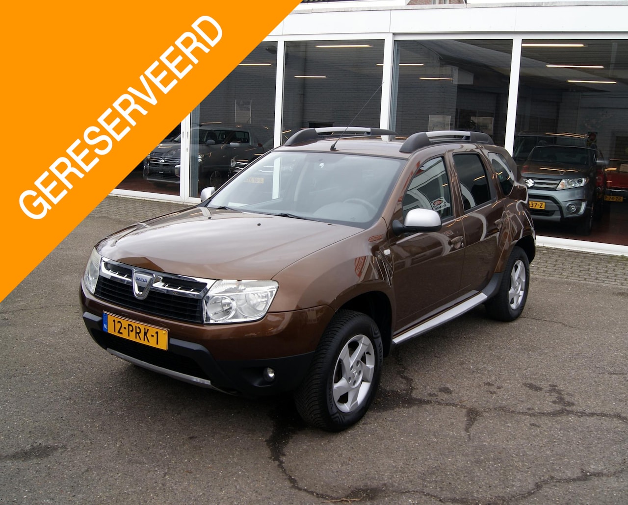 Dacia Duster - 1.6 Lauréate 2wd In opdracht van klant.  Pdc,Trekhaak,Rijklaarprijs!! - AutoWereld.nl