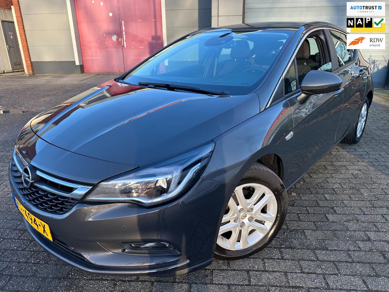 Opel Astra - 1.4i 16V TURBO 2016 1e EIGENAAR AUTOMAAT NAVI CAMERA NAP LUXE - AutoWereld.nl