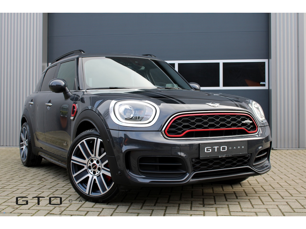 MINI Countryman - Mini 2.0 John Cooper Works ALL4 Chili Harman Kardon/Camera/Panoramadak/ Sportstoelen/Keyle - AutoWereld.nl