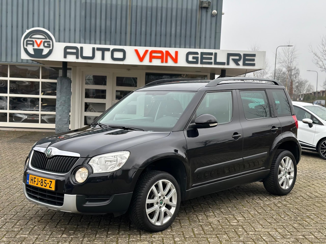 Skoda Yeti - 1.2 TSI Ambition Cruise Control*Parksensor*MMI Scherm*Stoelvw*Clima - AutoWereld.nl