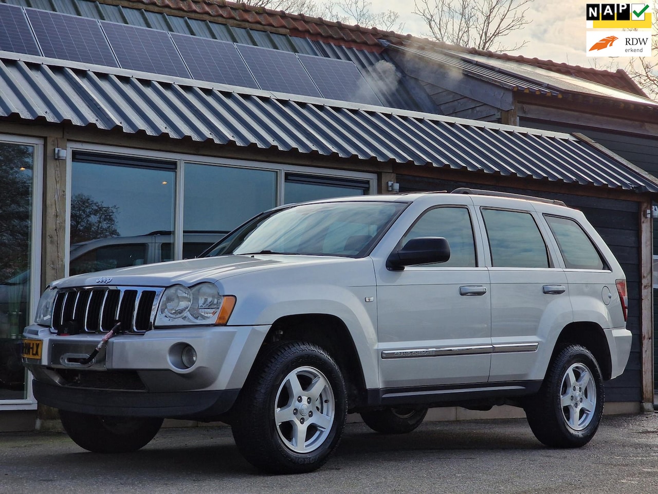 Jeep Grand Cherokee - 5.7 V8 Hemi Limited 5.7 V8 Hemi Limited (NL-Auto / NAP / Lier / Leder / Schuifdak / Trekhaak / 3360 KG Trekgew - AutoWereld.nl