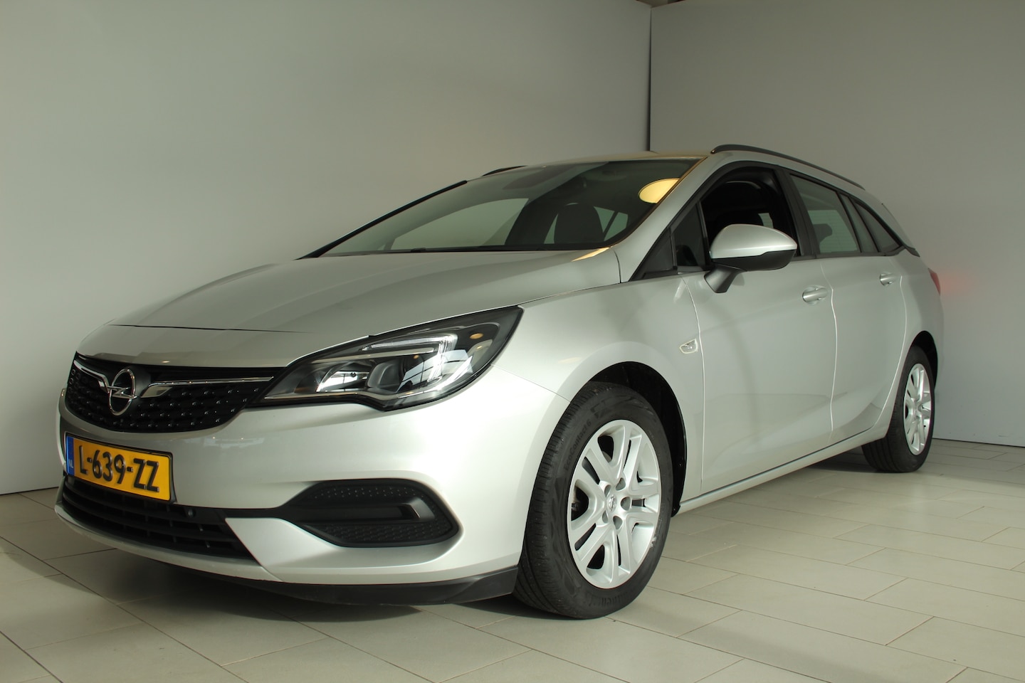 Opel Astra Sports Tourer - 1.4 Turbo 145pk Edition AUTOMAAT NAVI PDC - AutoWereld.nl