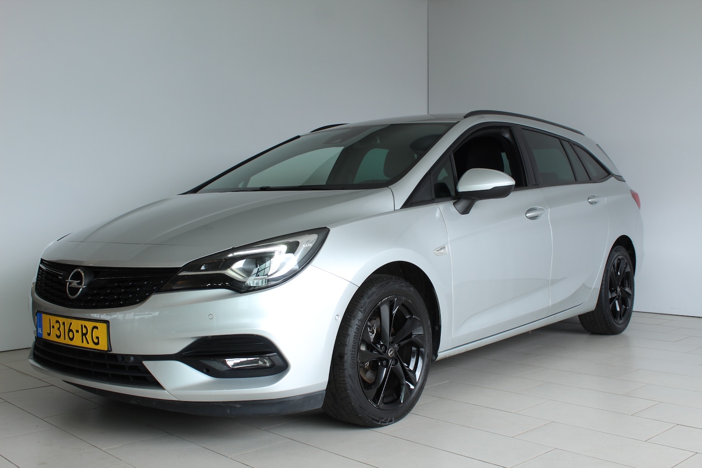 Opel Astra Sports Tourer - 1.2 Turbo 145pk Ultimate AGR TREKHAAK WINTERPACK CAMERA CARPLAY - AutoWereld.nl