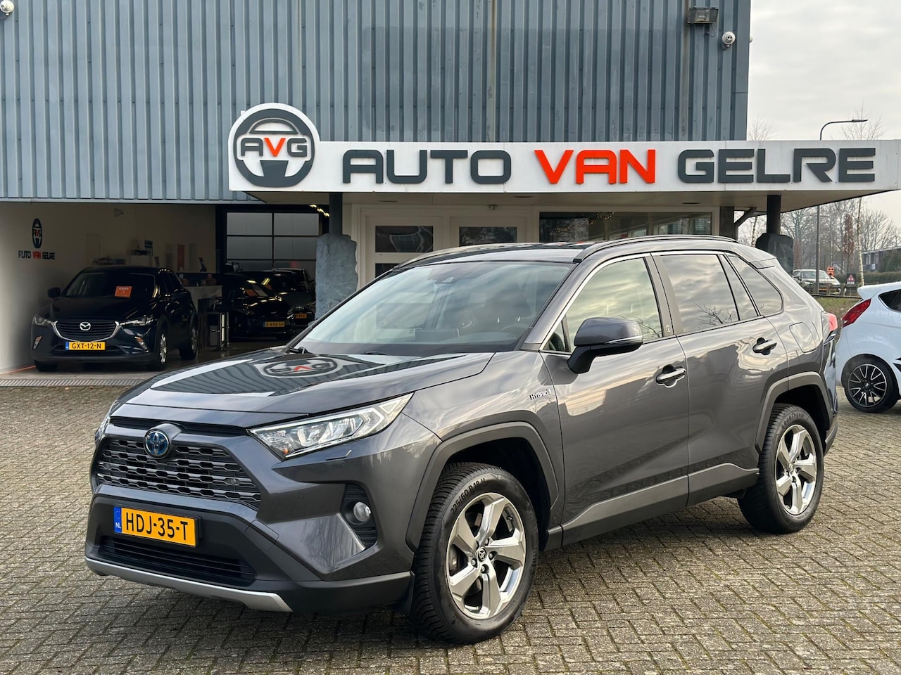 Toyota RAV4 - 2.5 Hybrid B-Plus Dealer O.H. & 1e Eigenaar*NAVI*Camera*PDC*Stoel&Stuur VW - AutoWereld.nl