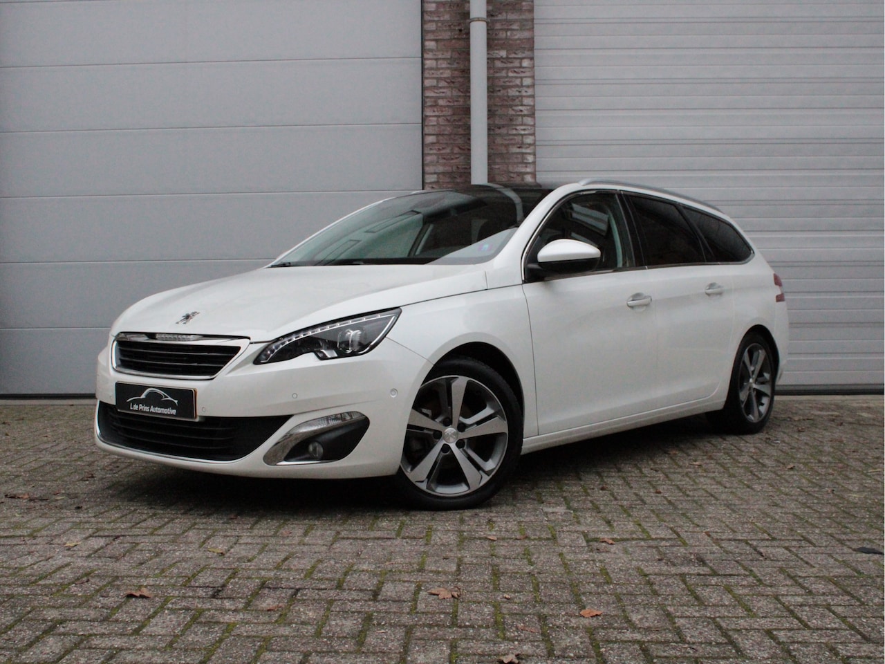 Peugeot 308 SW - 1.2 e-THP Première Export/Olieverbruik - AutoWereld.nl