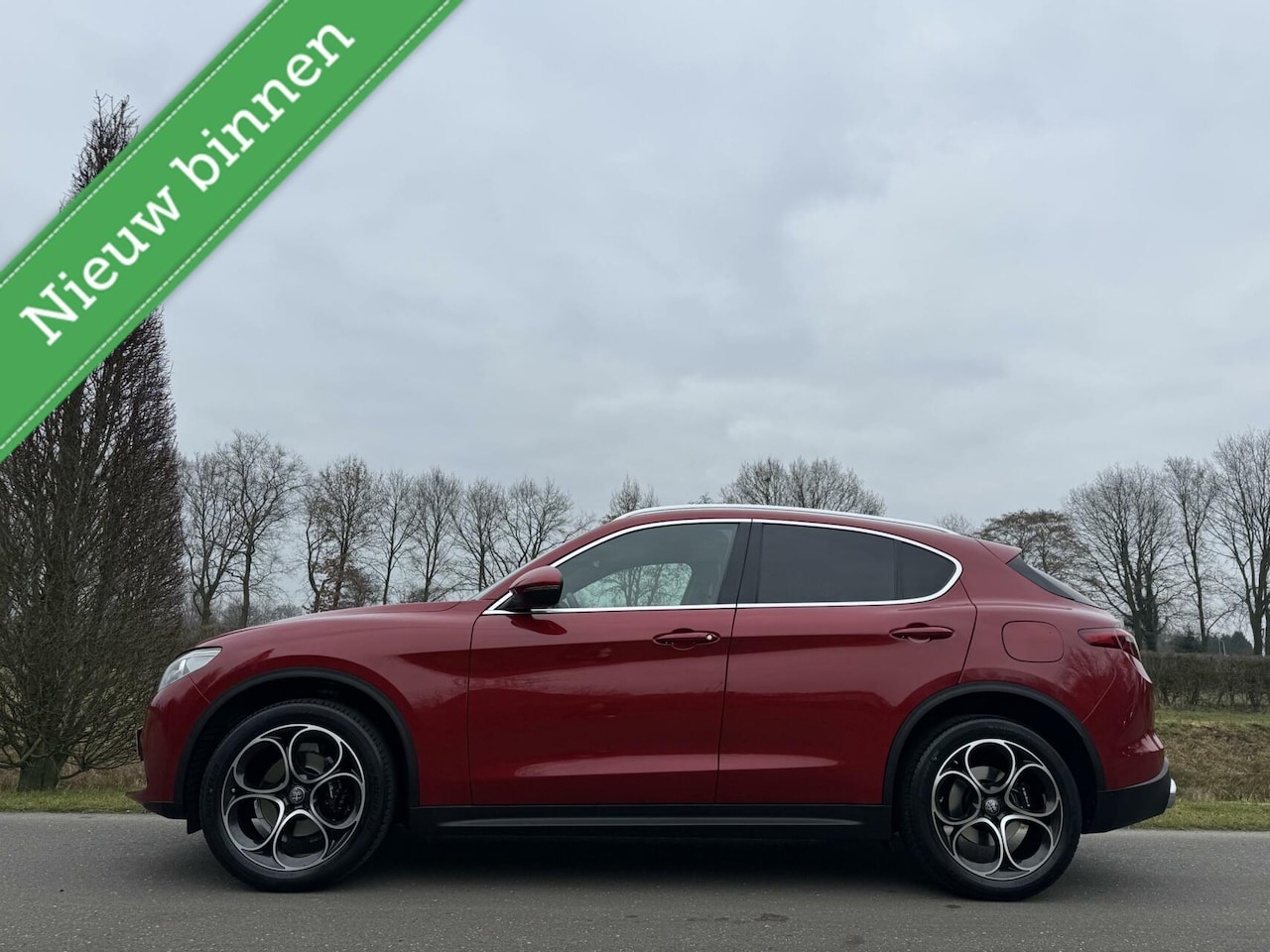 Alfa Romeo Stelvio - 2.0t Q4 280pk, Veloce, Rosso Competizione - AutoWereld.nl