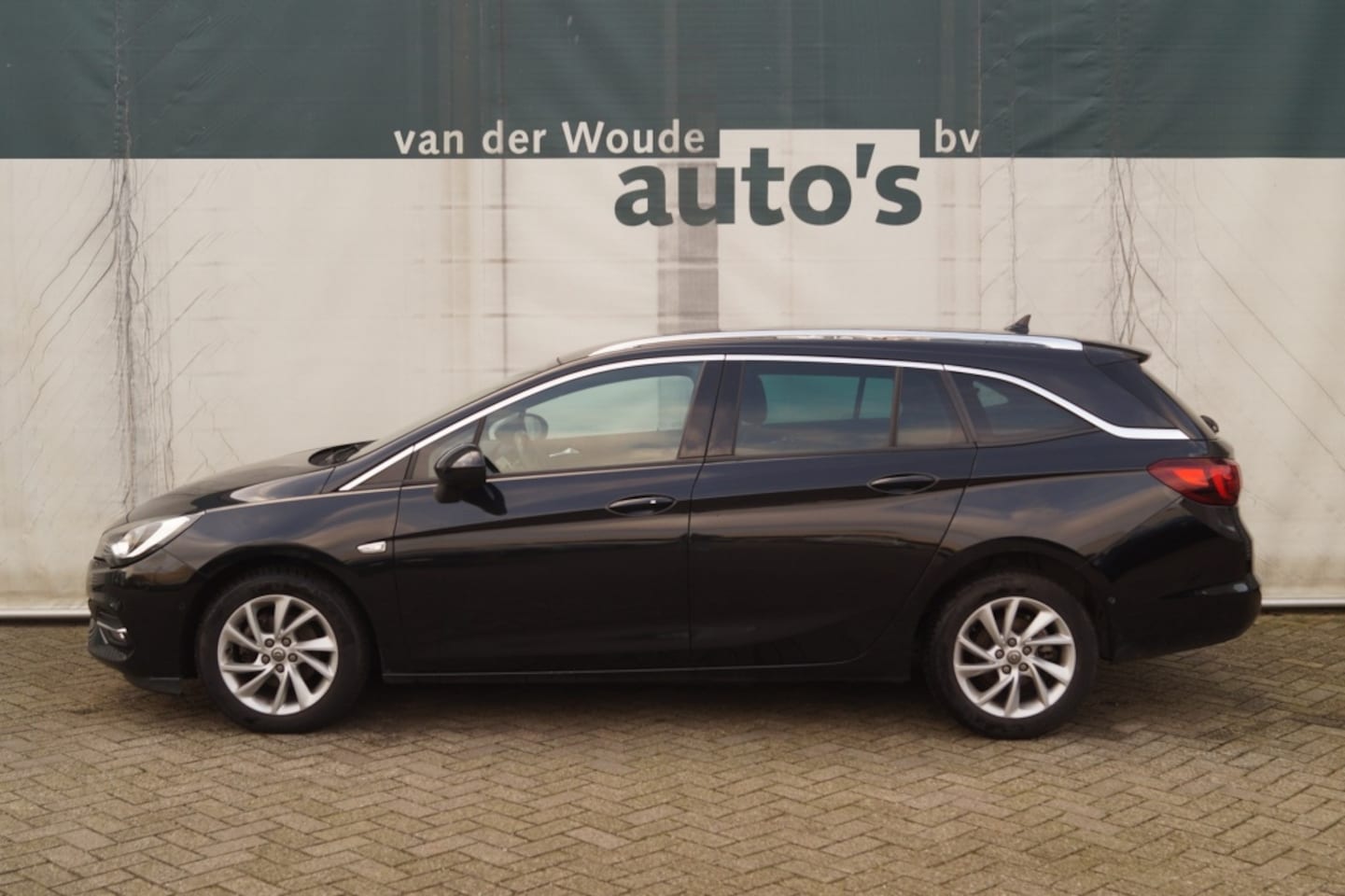 Opel Astra Sports Tourer - 1.2 110pk Elegance -ECC-NAVI-CAM- - AutoWereld.nl