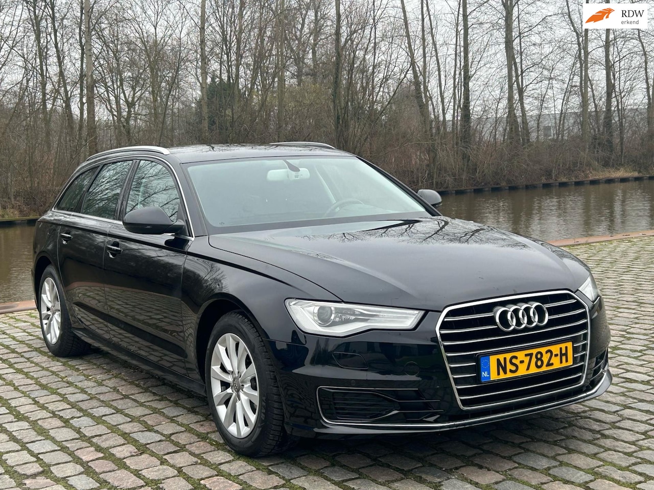 Audi A6 Avant - 1.8 TFSI ultra Business Edition Automaat navigatie cruis control parkeer sensor - AutoWereld.nl