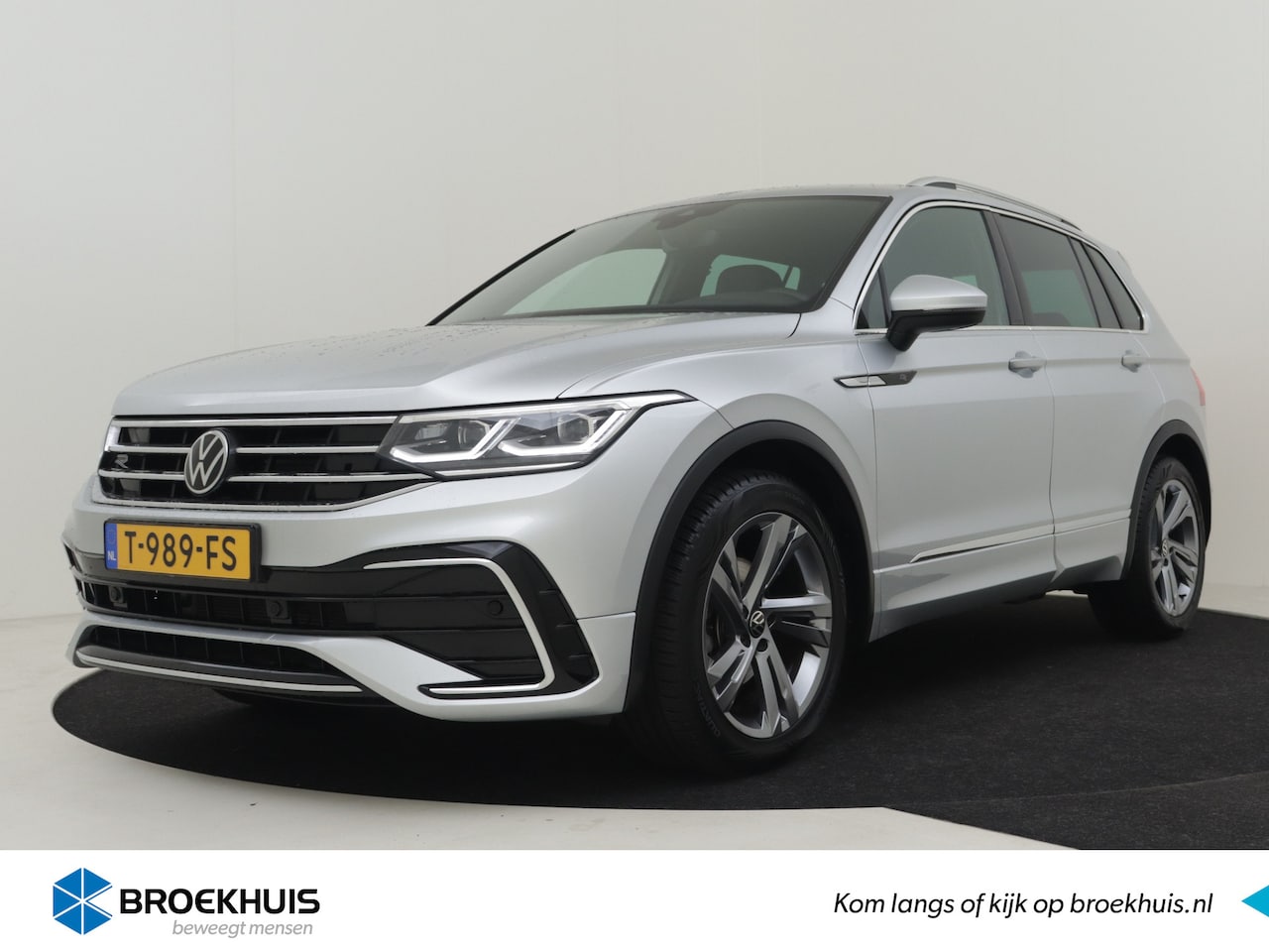 Volkswagen Tiguan - 1.5 TSI R-Line Business 150pk DSG/AUT | Adaptief cruise control | Trekhaak | Navigatie | K - AutoWereld.nl