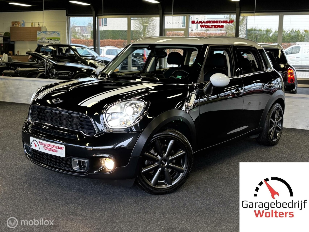 MINI Countryman - 1.6 Cooper S LEER LMV SET WINTERBANDEN - AutoWereld.nl