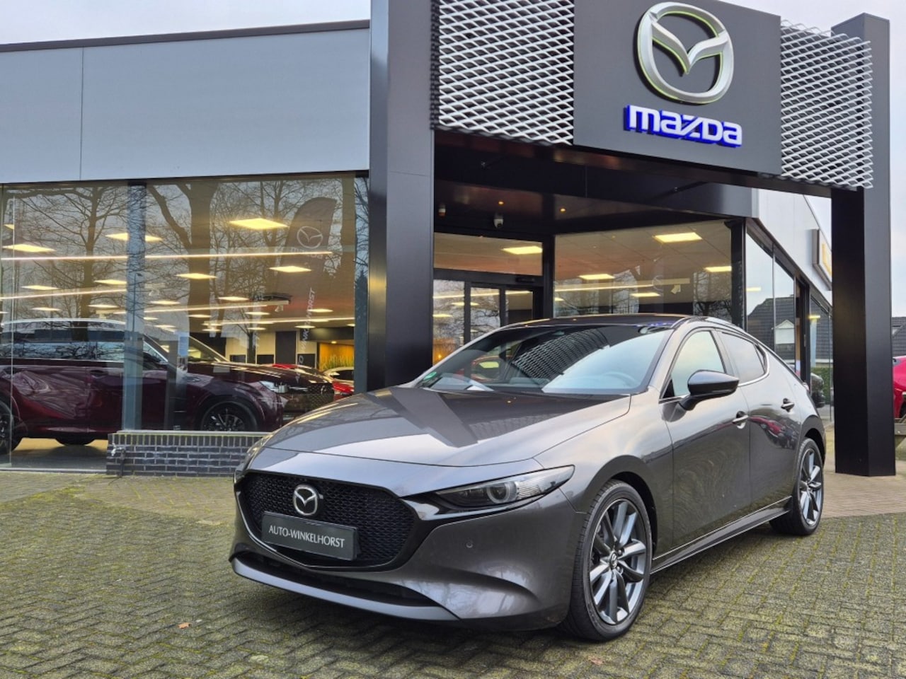 Mazda 3 - SKYACTIV-G 122 6MT M-HYBRID LUXURY / I-Active sense Pack - AutoWereld.nl