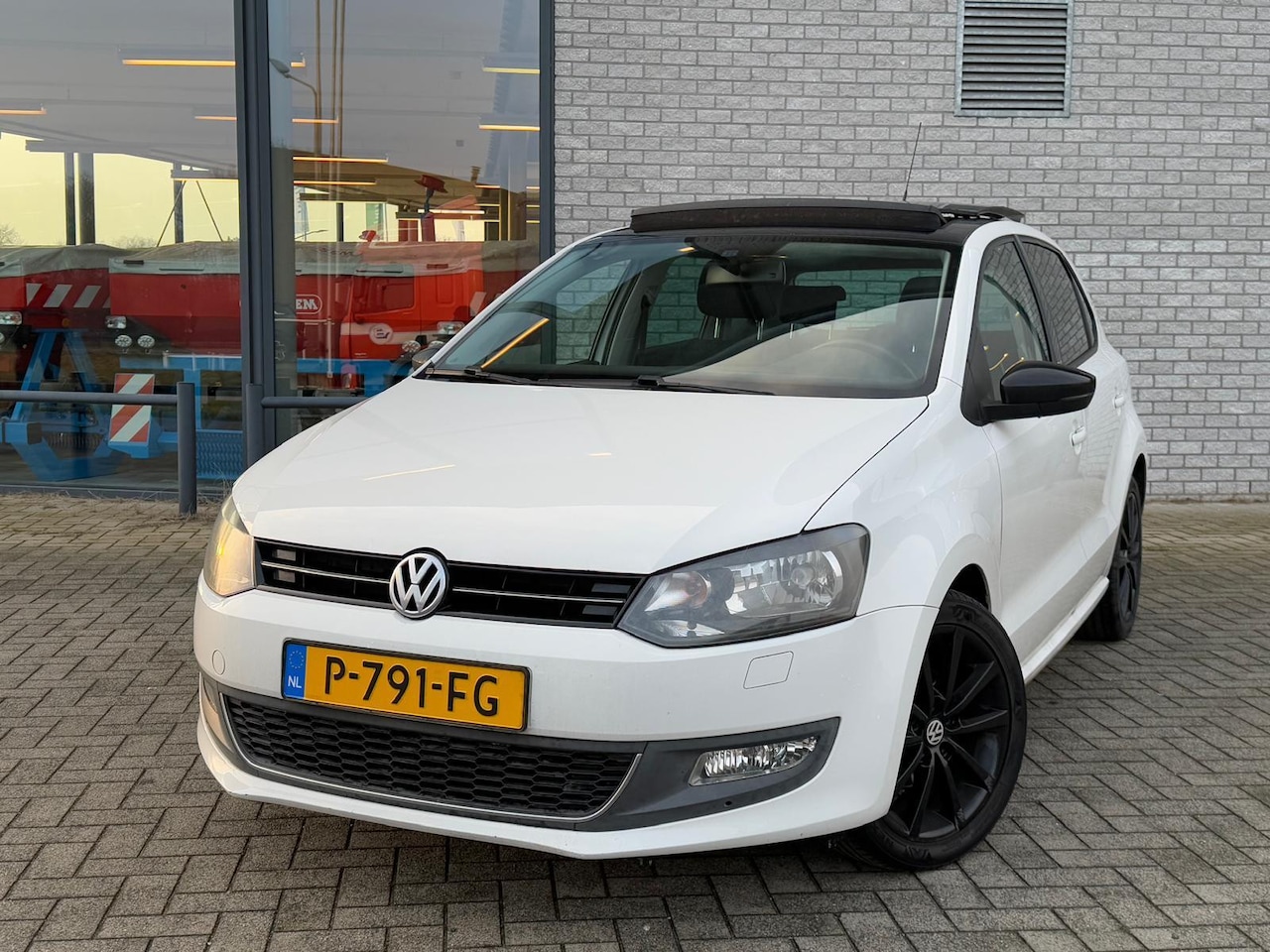 Volkswagen Polo - 1.2-12V Panoramadak Navi - AutoWereld.nl