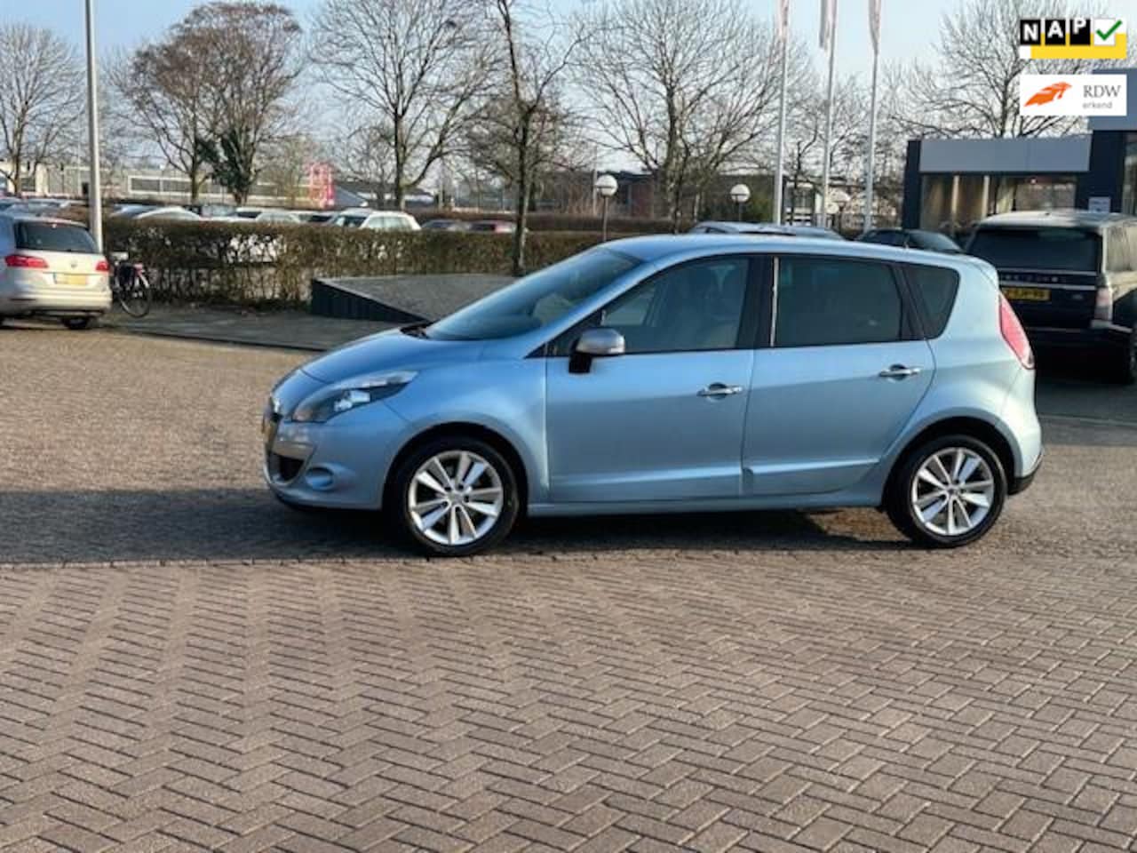 Renault Scénic - 1.6 Celsium 1.6 Celsium,bj.2011,kleur:blauw ! NAP met 131699 km.en APK tot 02/2026 ! Climate,Navigatie - AutoWereld.nl