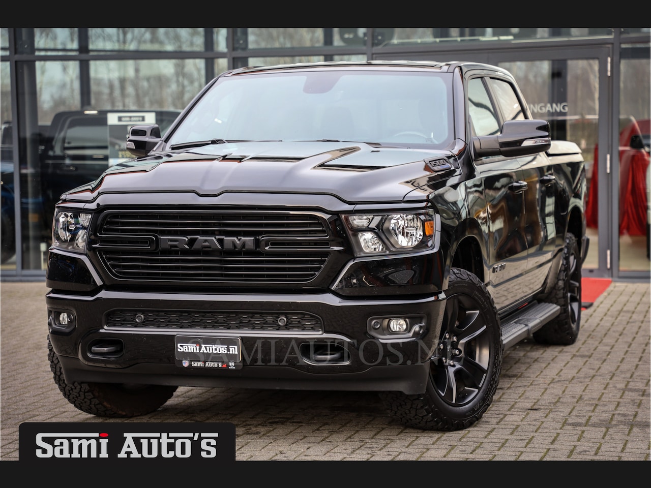 Dodge Ram 1500 - 5.7 V8 BLACK OPS | CAMERA | LUCHTREM SYSTEEM | LEDER | CRUISE | 200L LPG | STOEL/STUUR VER - AutoWereld.nl