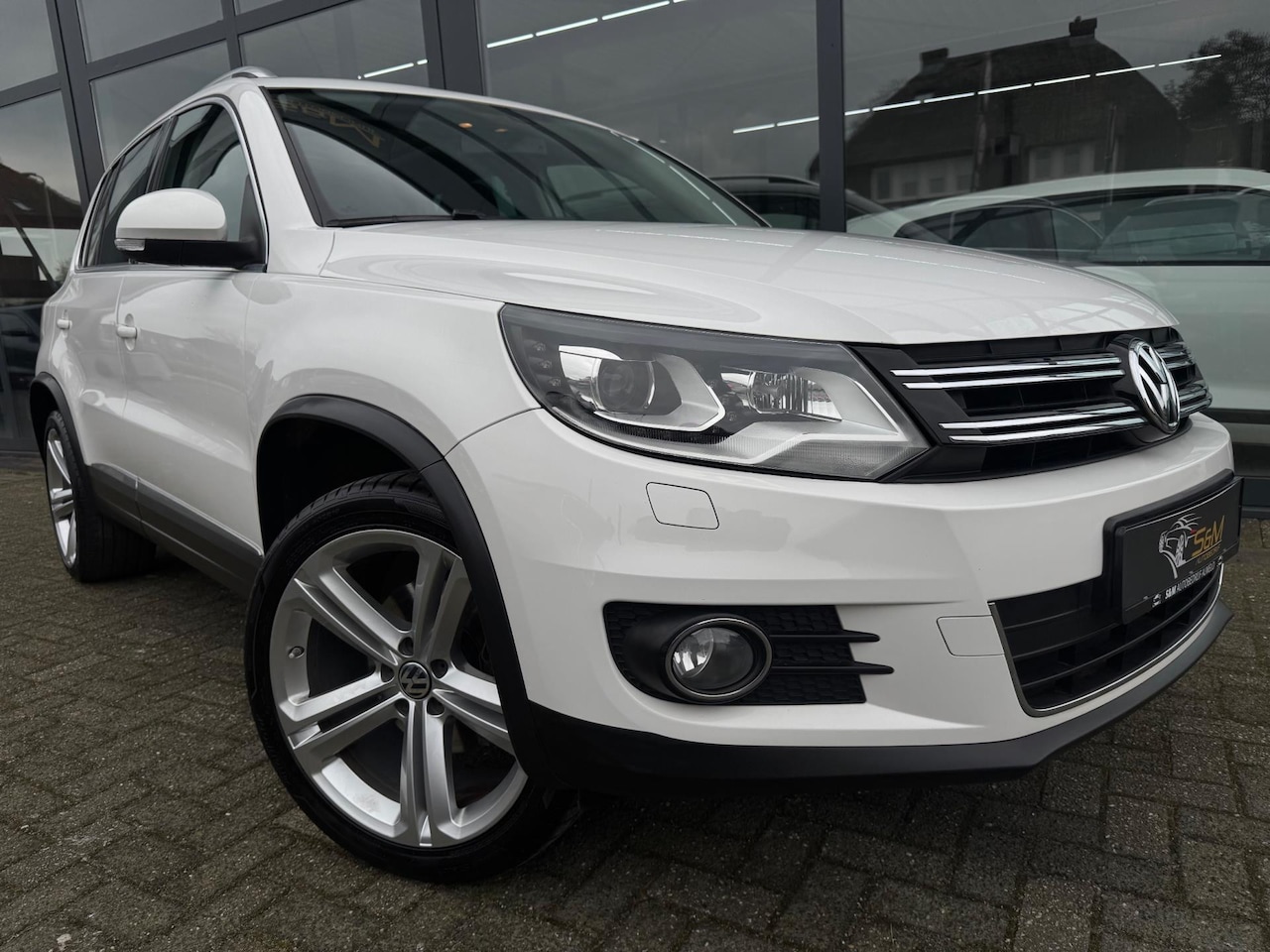 Volkswagen Tiguan - 1.4 TSI Sport&Style R-line Edition - AutoWereld.nl