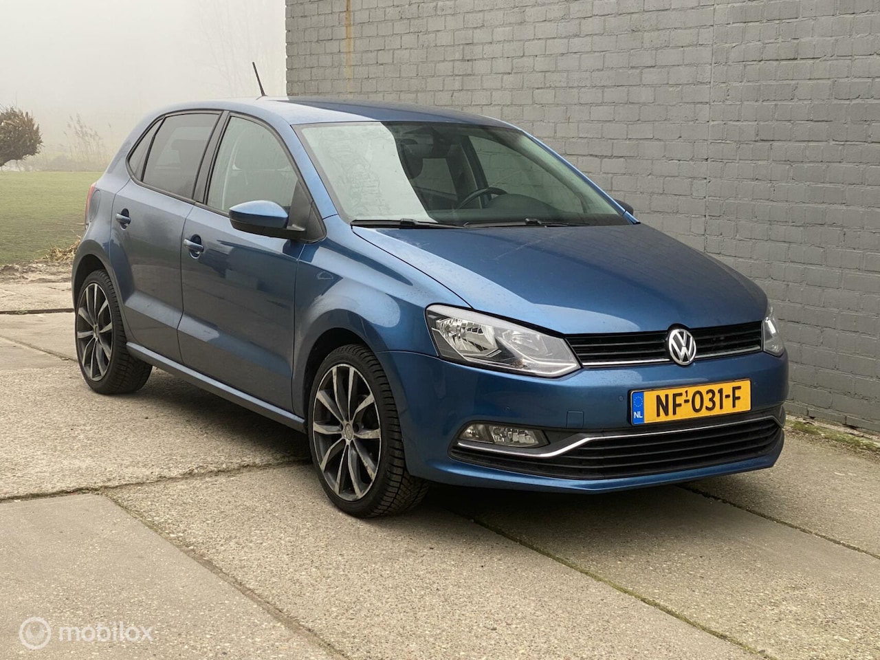 Volkswagen Polo - 1.2 TSI Highline Navi / PDC / NAP / Airco - AutoWereld.nl