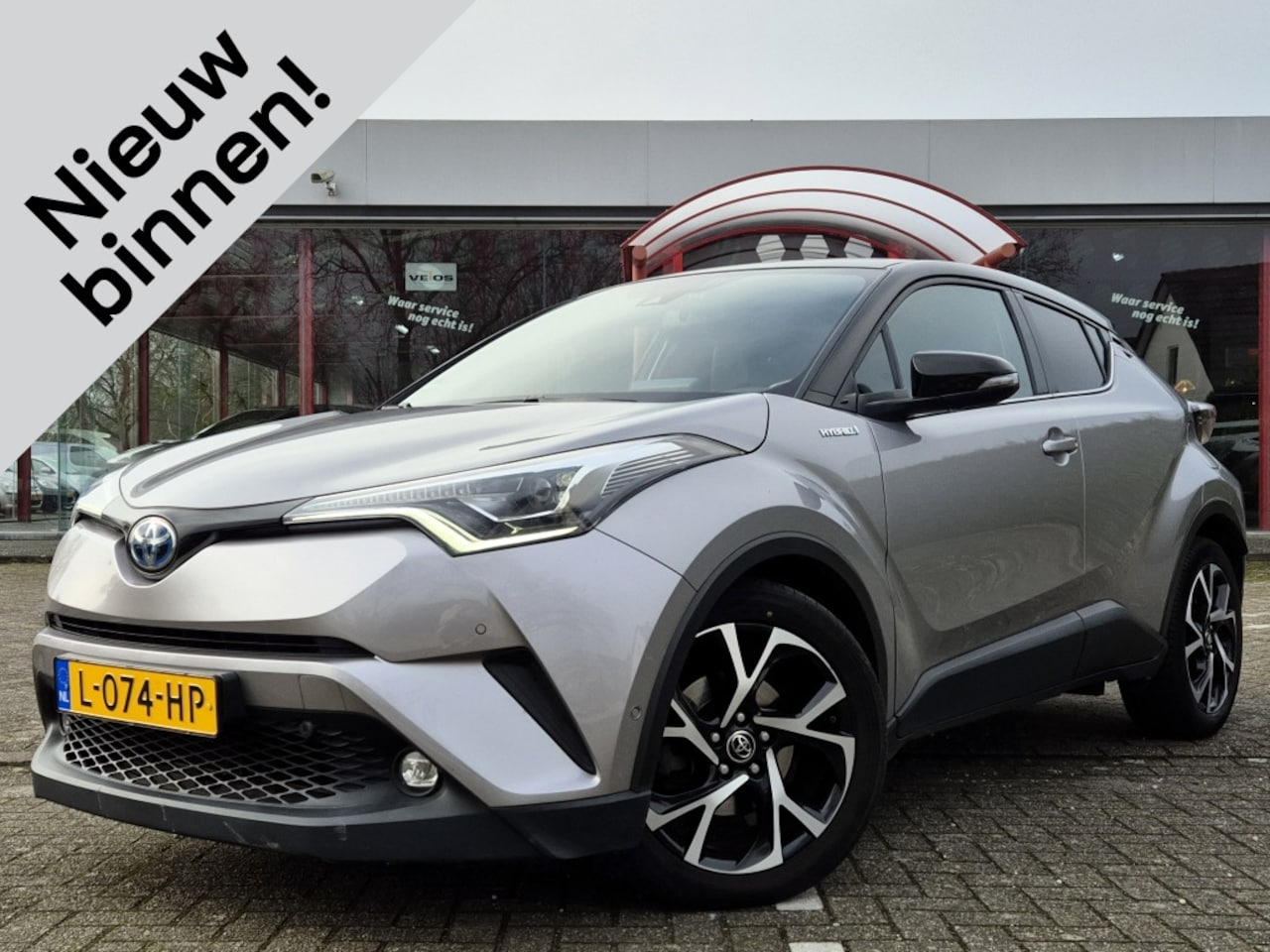 Toyota C-HR - 1.8 Hybrid Automaat Adventure | Stoelverwarming | Leder | Naviga - AutoWereld.nl