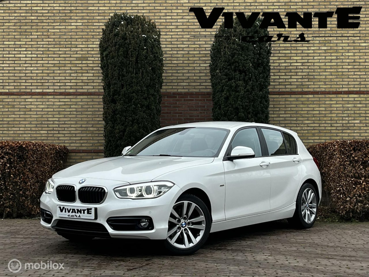 BMW 1-serie - 120i 184pk Centennial High Executive AUT. Cruise | Clima - AutoWereld.nl