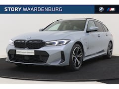 BMW 3-serie Touring - 330e High Executive M Sport Automaat / Panoramadak / Trekhaak / Sportstoelen / Adaptieve L