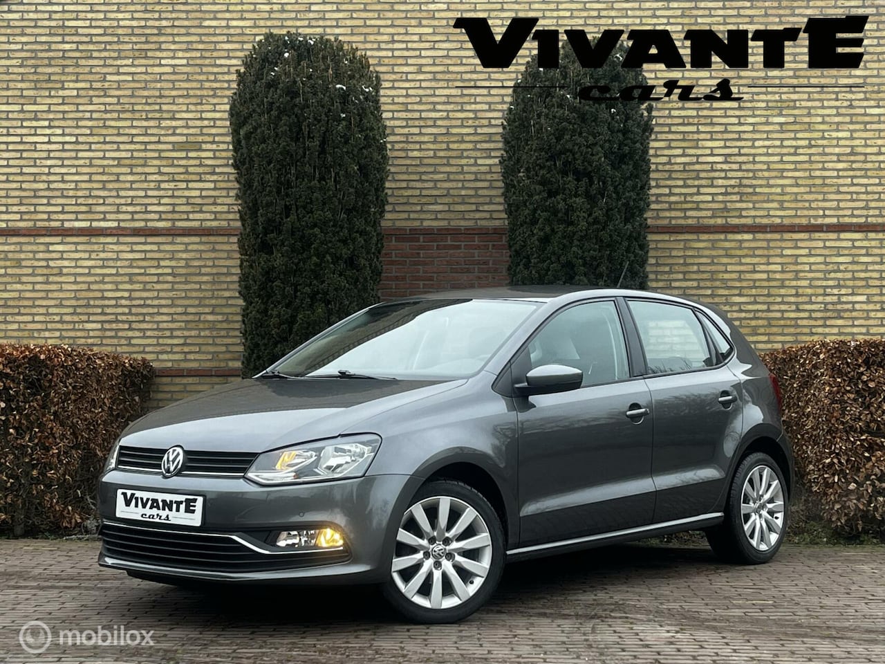 Volkswagen Polo - 1.2 TSI Comfortline DSG*Apple Carplay*Cruise*Clima - AutoWereld.nl