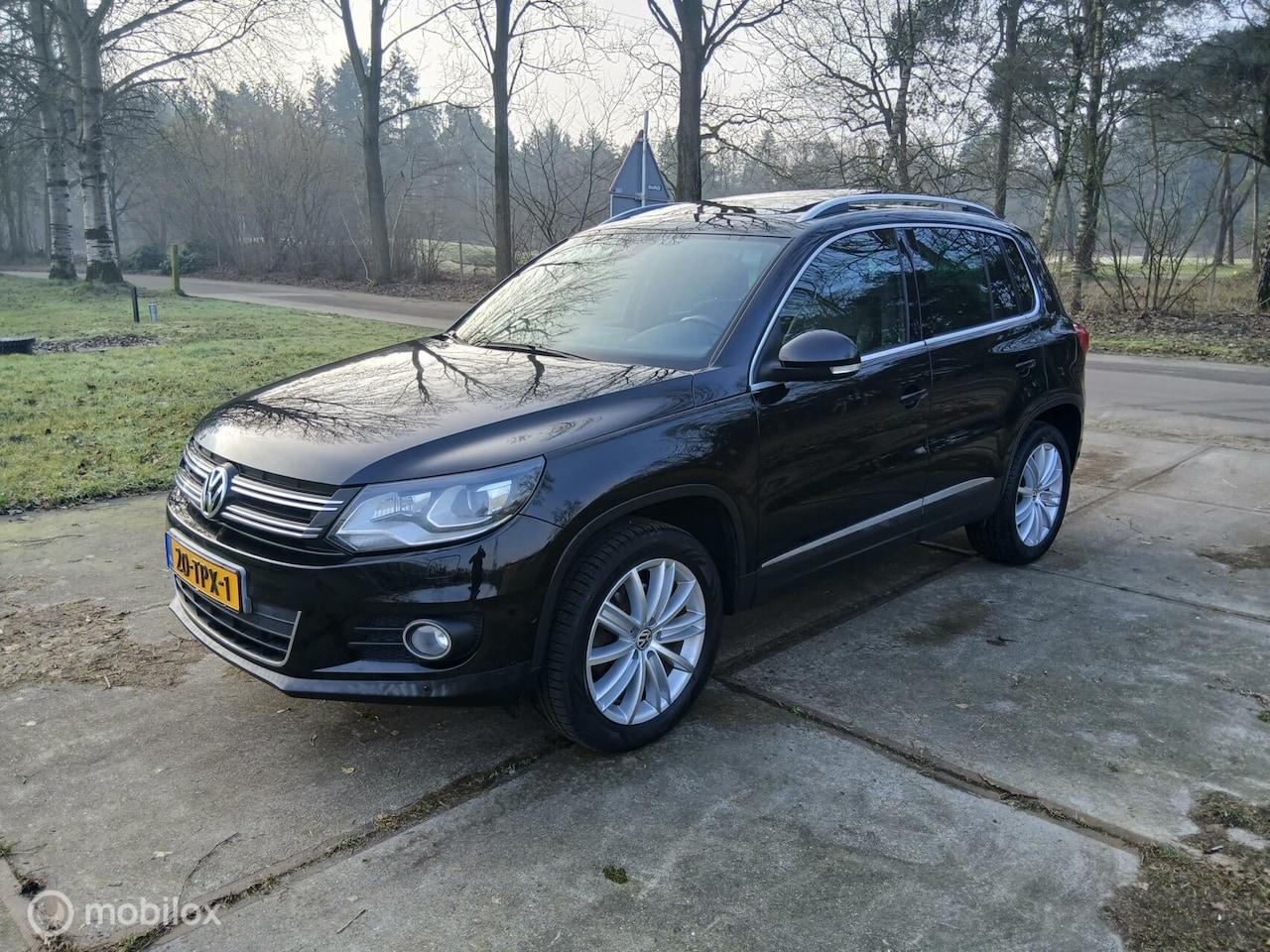 Volkswagen Tiguan - 1.4 TSI Sport&Style - AutoWereld.nl