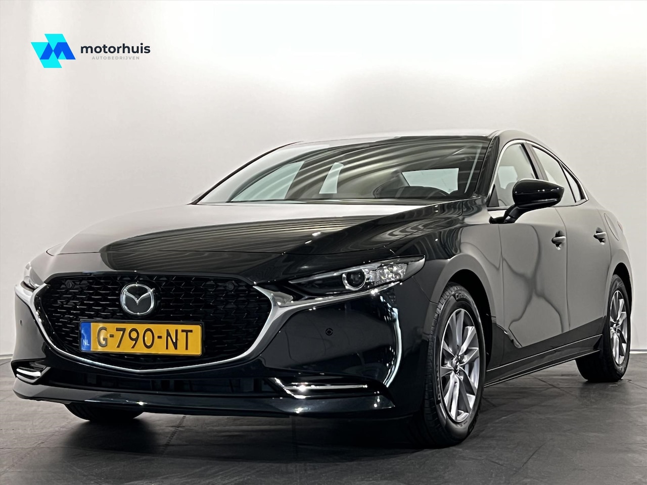 Mazda 3 - Sedan 2.0 e Skyactive-M HYBRID 180 COMFORT MET BOSE - AutoWereld.nl