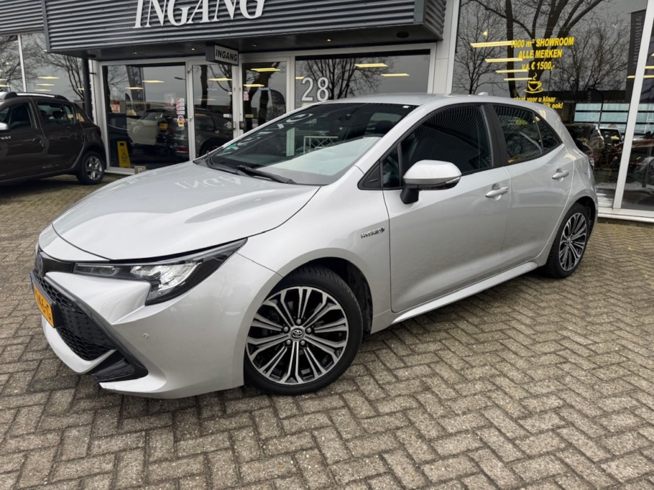 Toyota Corolla - 1.8 Hybrid First Ed. AUTOMAAT!./ Climate/ Cruise/ NAP!! - AutoWereld.nl